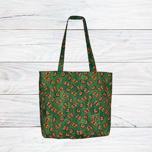 Monarch Butterflies on Green Handmade Tote Bag
