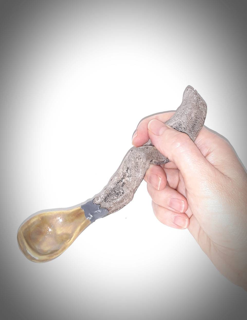 Handmade porcelain spoon with natural wooden handle