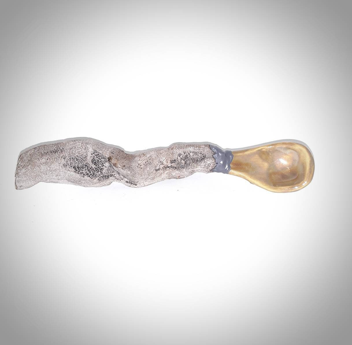 Handmade porcelain spoon with natural wooden handle