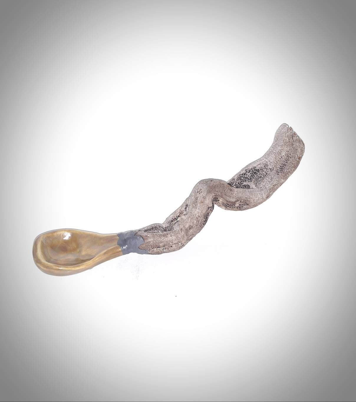 Handmade porcelain spoon with natural wooden handle